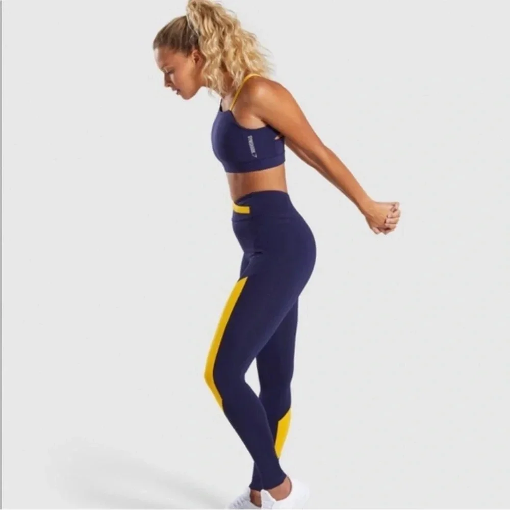 Gymshark Navy Blue Yellow High Rise Asymmetrical Crossover Leggings Size Small